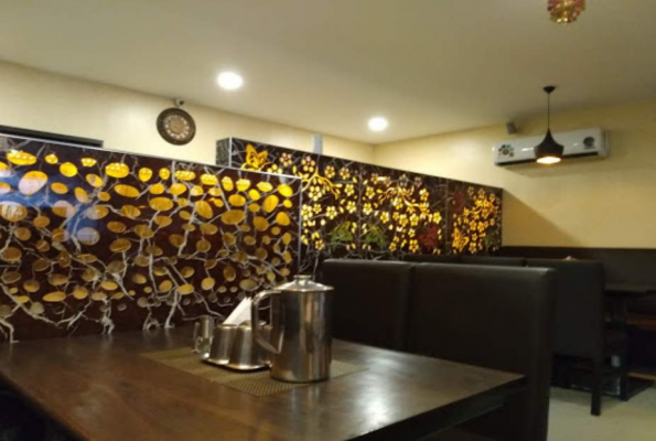 Cozy corner table with decorative wall panels